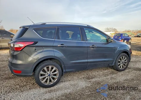 2017 Ford Escape Titanium z USA, uszkodzony, nr VIN 1FMCU9JDXHUE33011
